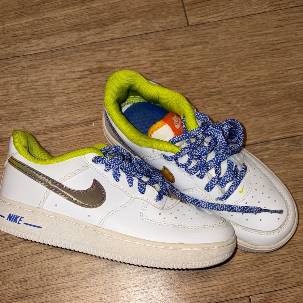 Nike White Sneakers with Blue and Yellow Accents